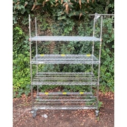 3_shelf_demountable_roll_cage_with_2_braked_castors_and_adjustable_height_shelves_with_additional_black_clips_to_increase_stablilty_and_load_capacity_2_1667408902