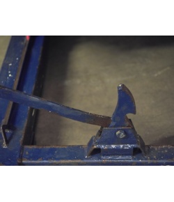 second hand tipping skip release mechanism